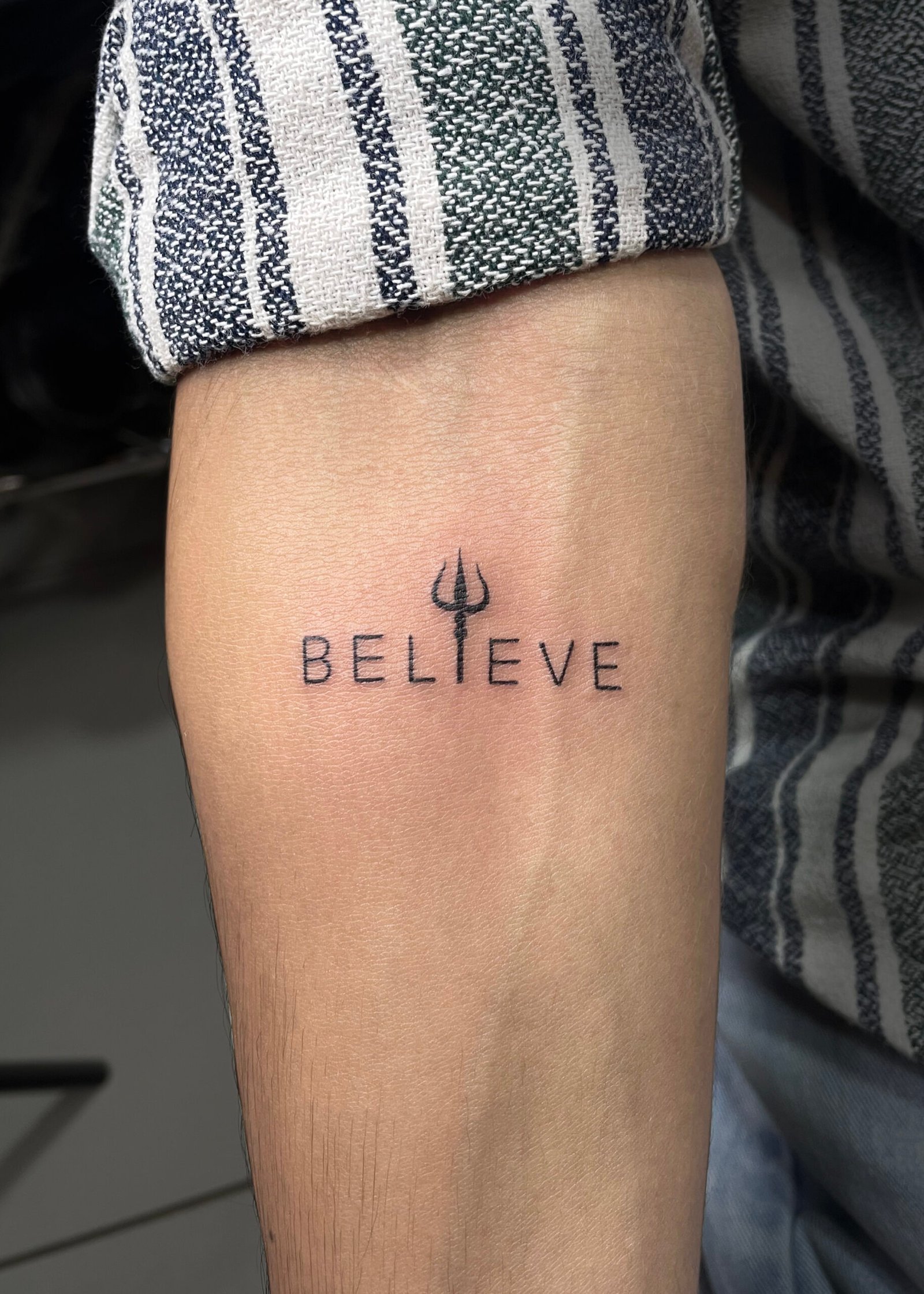Believe trishul tattoo