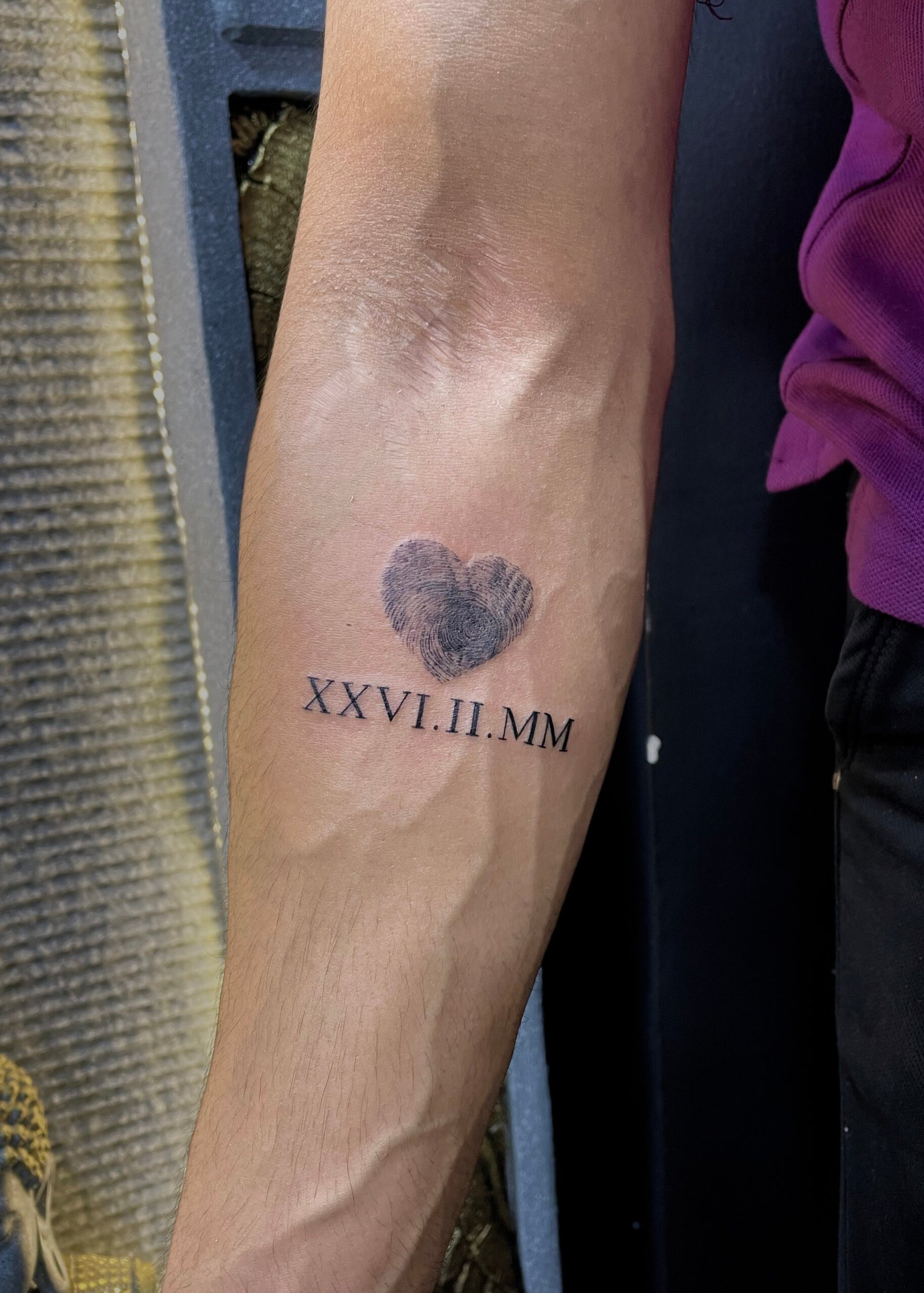 thumbh print with date of birth tattoo